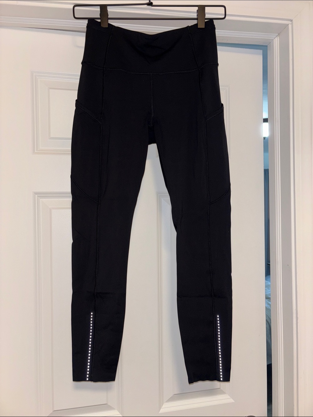 High-Waist Black Lululemon Leggings with Reflective Ankle Detail